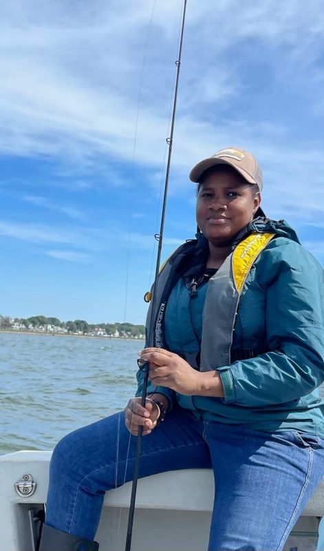Mary Adebote on a boat